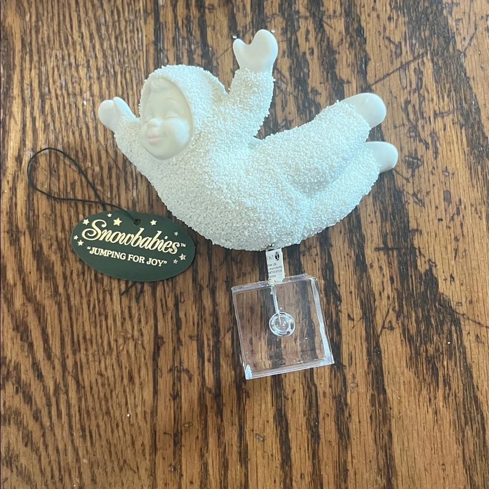 Snowbabies jumping for joy new in box